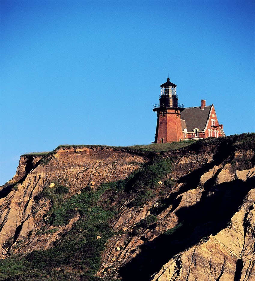 brick lighthouse atop a cliff